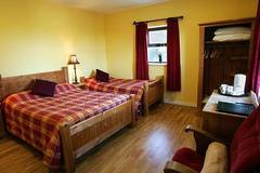 Family room with a double bed and a single bed