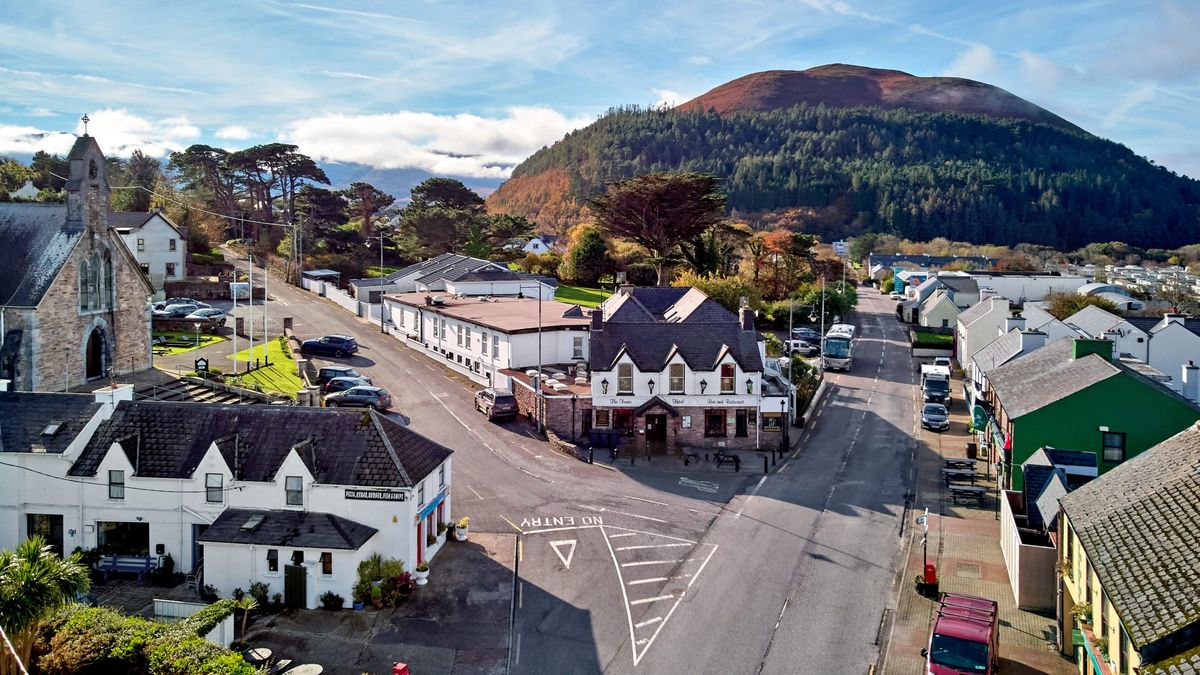 Glenbeigh village from the air, with the Seefin Mountains behind