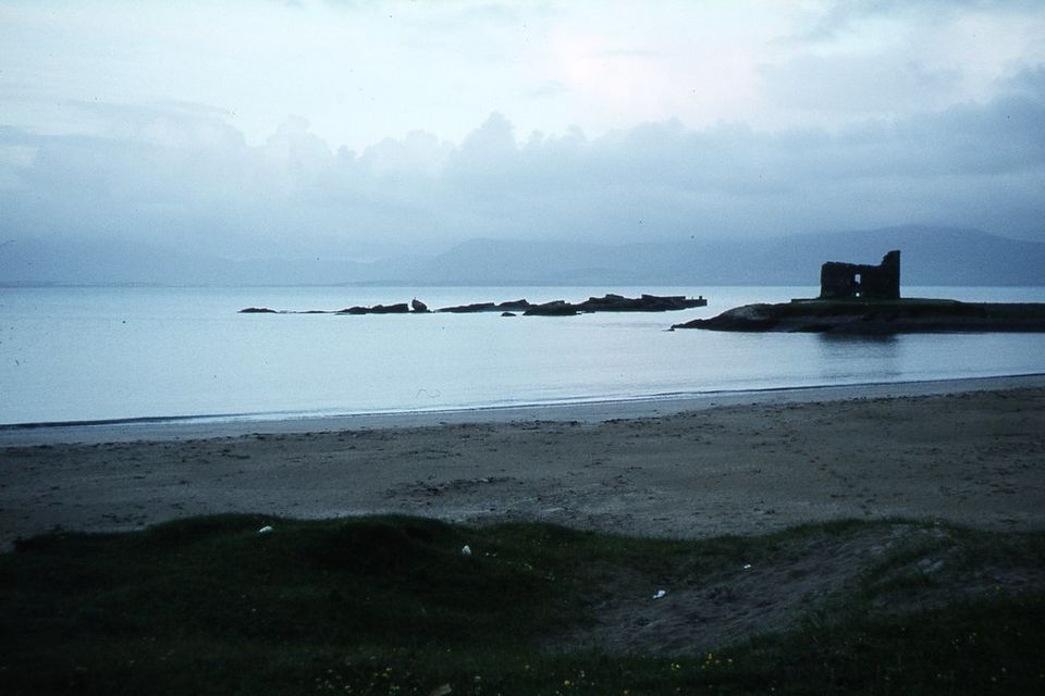 Ballinskelligs Castle on its spit, with the beach beyond