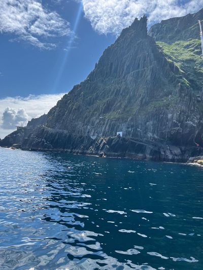 A steep rocky island rising out of the sea